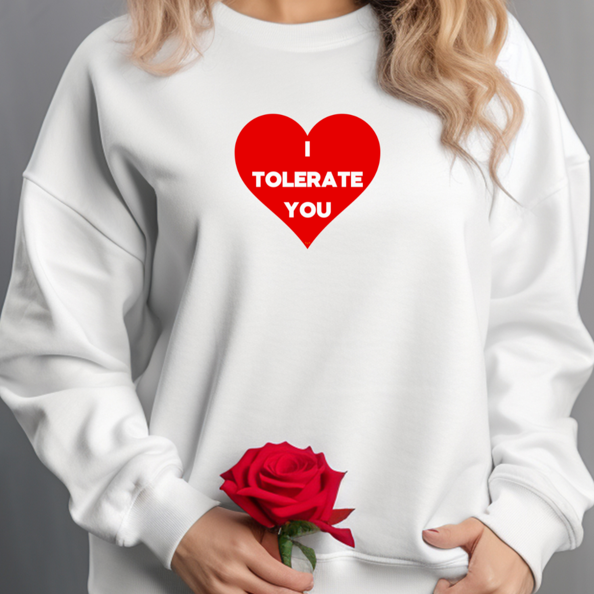 Female model wearing white sweatshirt with "I tolerate you" Original Nine-29 Design