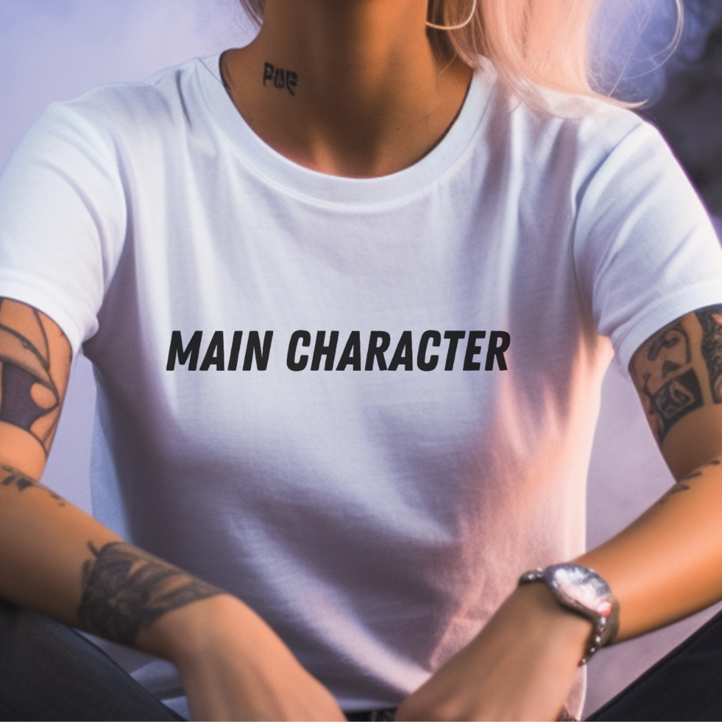 Female model wearing white t-shirt with "Main character" Original Nine-29 Design