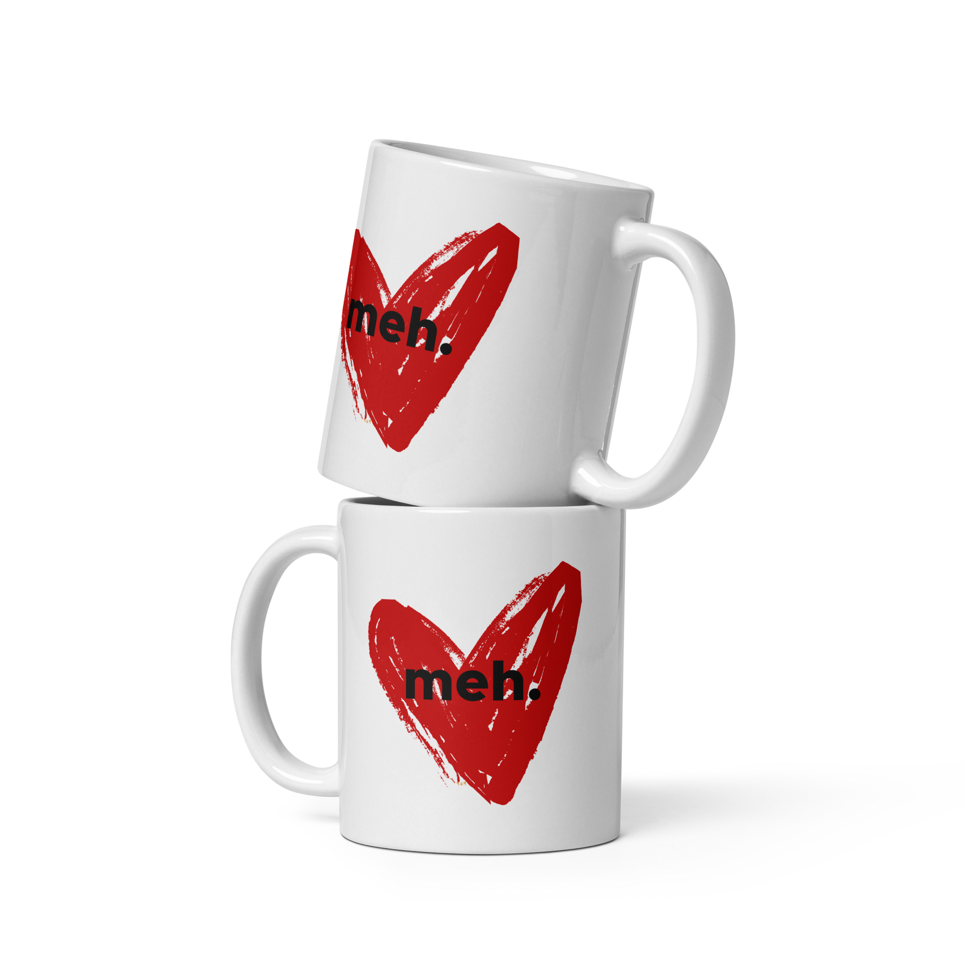 Two stacked-up white mugs with "meh" Original Nine-29 Design