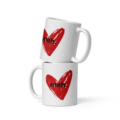 Two stacked-up white mugs with "meh" Original Nine-29 Design